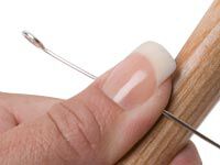 Curving wire on a wooden rod